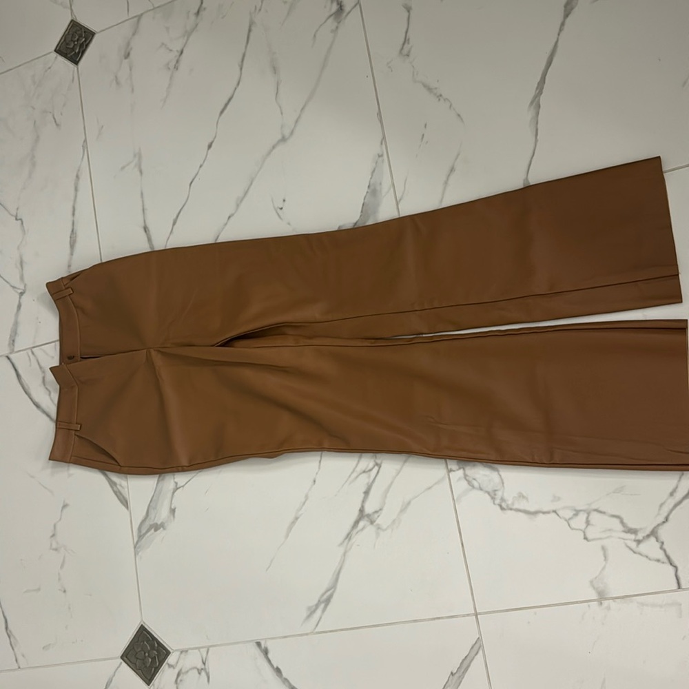 Size medium Meshki faux leather pants never worn with tags on
